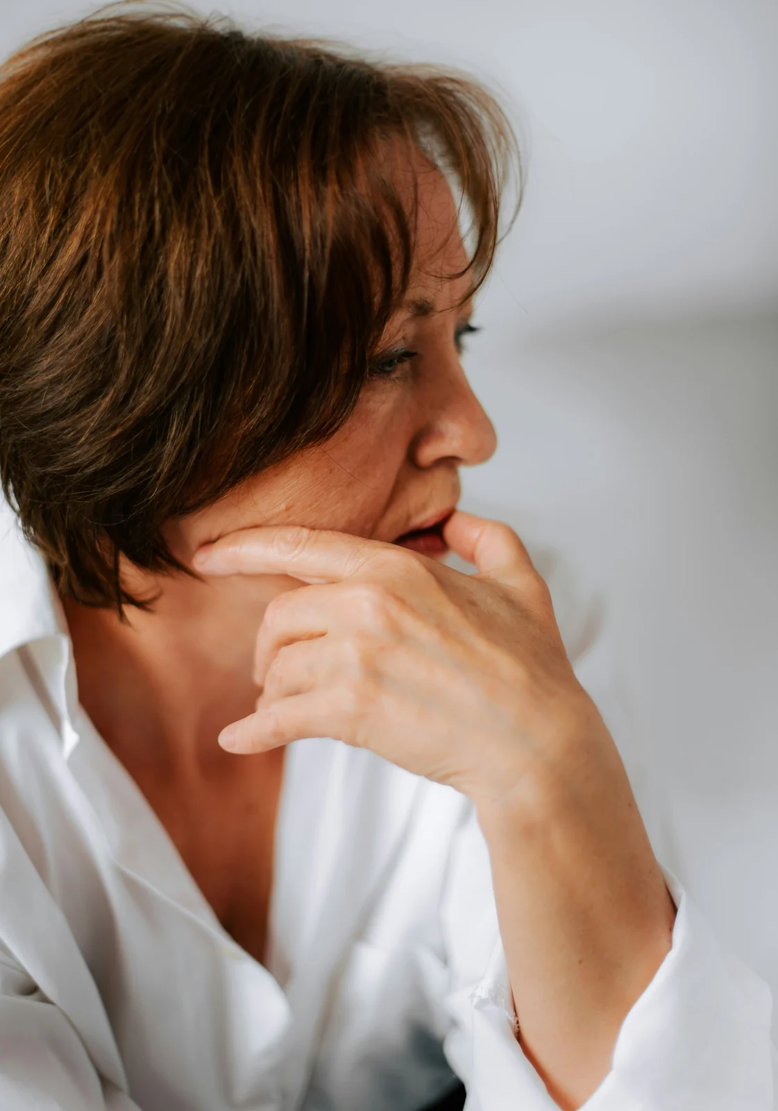 A woman weighing up whether to start treatment