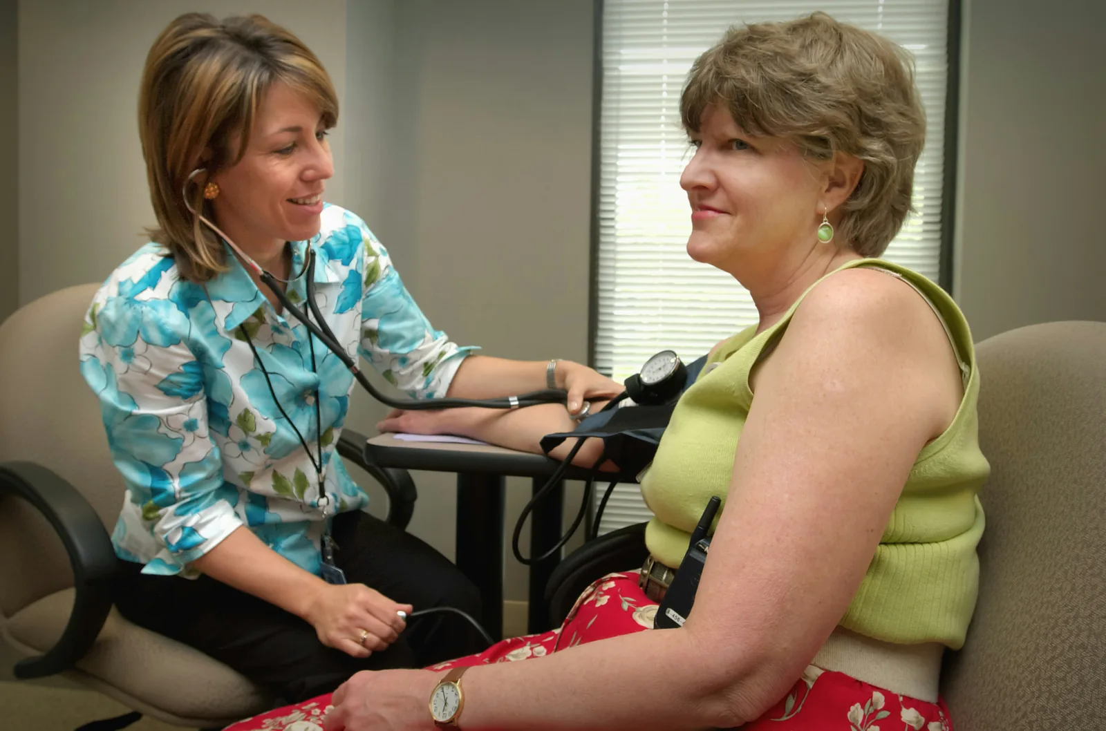 A clinician carrying out a check-up