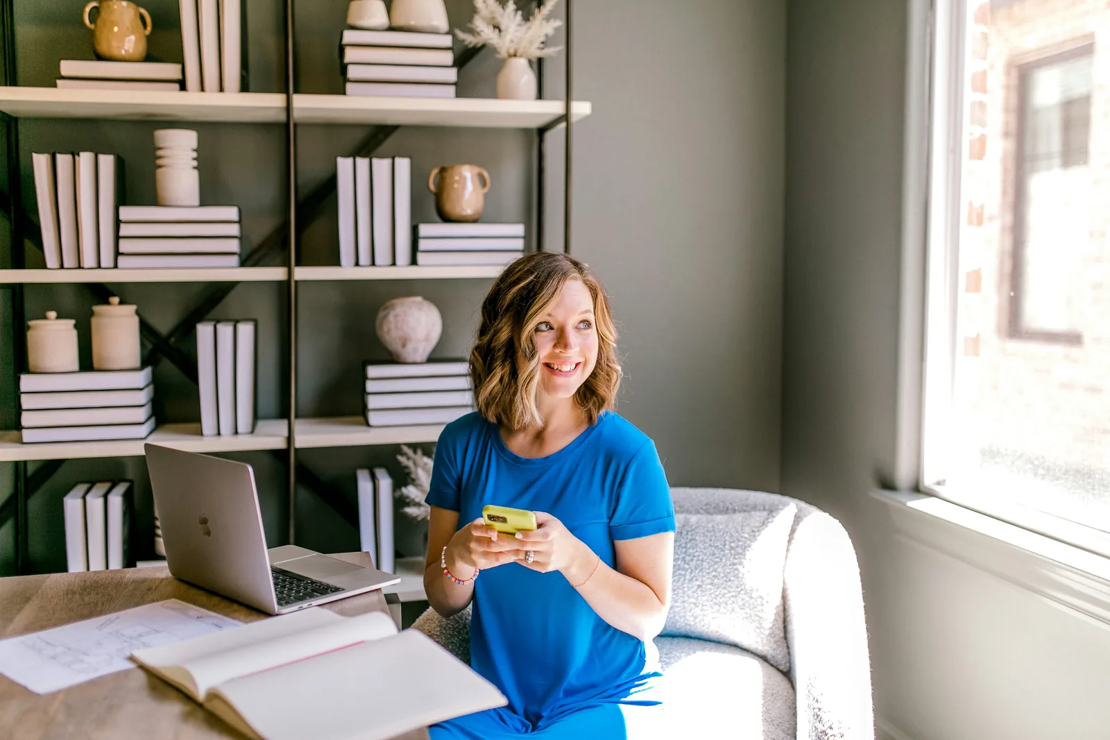 A woman booking an appointment from home