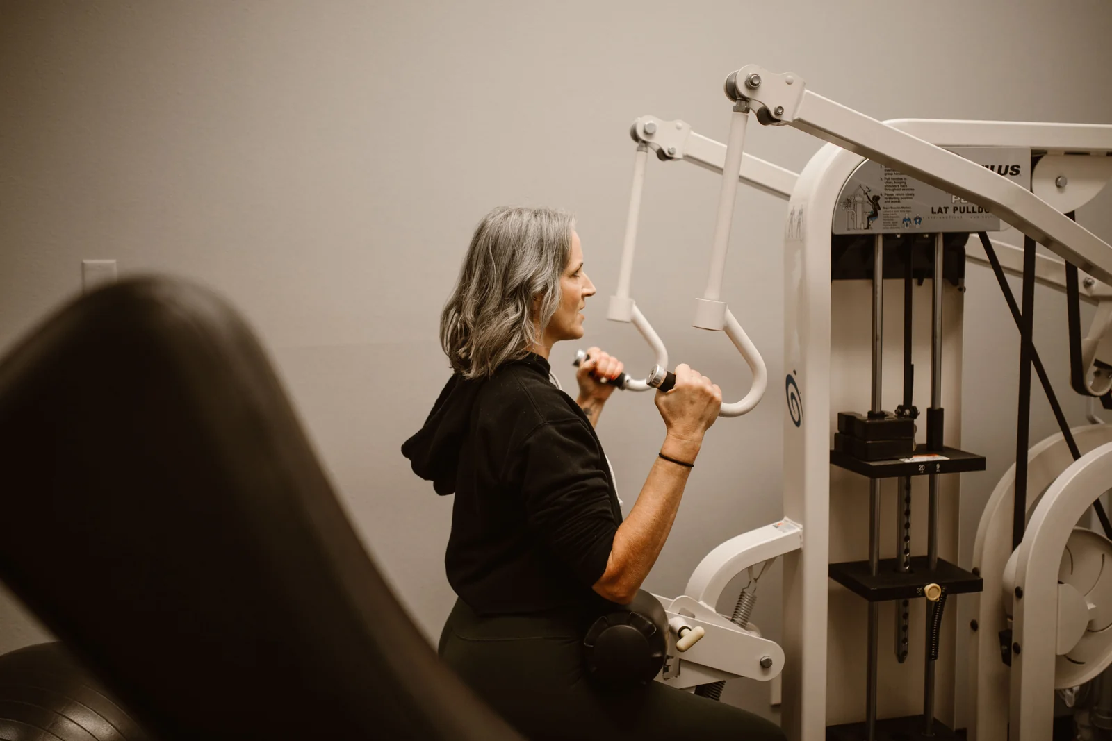 A woman in her fifties doing resistance training
