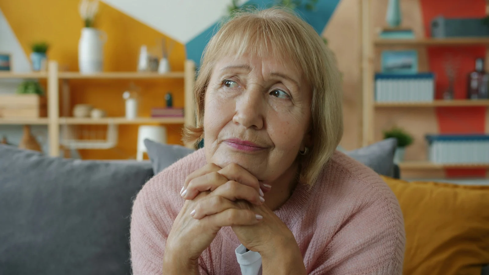 A woman thinking a decision over at home